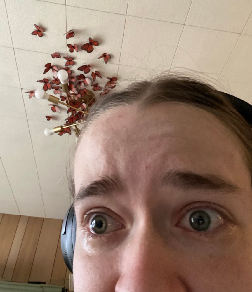 Close up of Nicole’s face. Her eyes are watery because she just cut an onion and is in pain