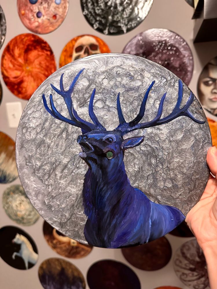 Painting is a 10" record glazed like a full moon with a bugling elk silhouetted in the foreground. 