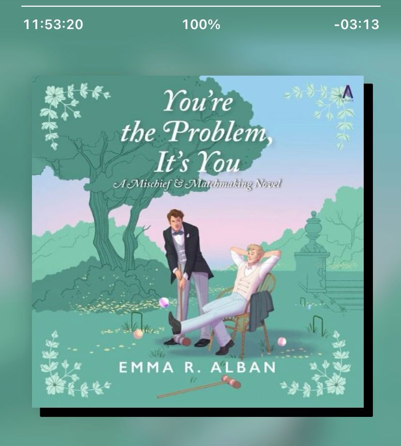 The audiobook cover of Emma R Alban’s You’re the Problem, It’s You. In a garden, one young blond-haired white man lounges on a chair while a young brown-haired white man stands slightly bent over nearby with a croquet mallet. 