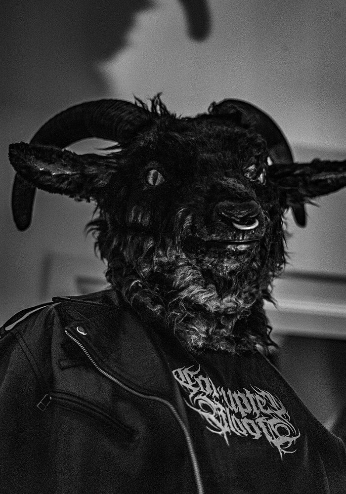 Close-up shot of me wearing my fursuit head, black/white photo