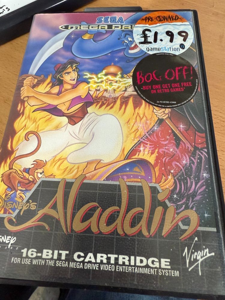 Aladdin on the Mega Drive.  Infuriatingly for anyone that buys games now the price sticker shows it cost me £1.99. And was part of a Buy one get one free.