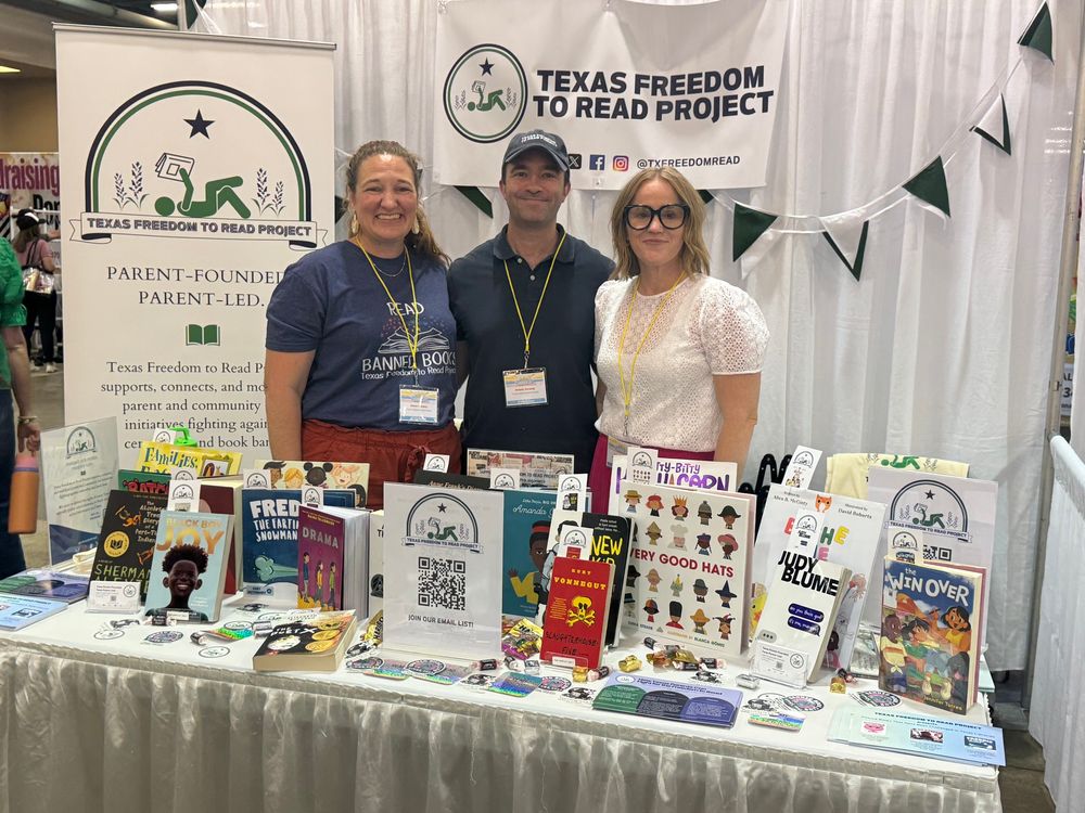 Photo of Texas Freedom to Read Project’s cofounders at their booth at Texas PTA Launch exp!