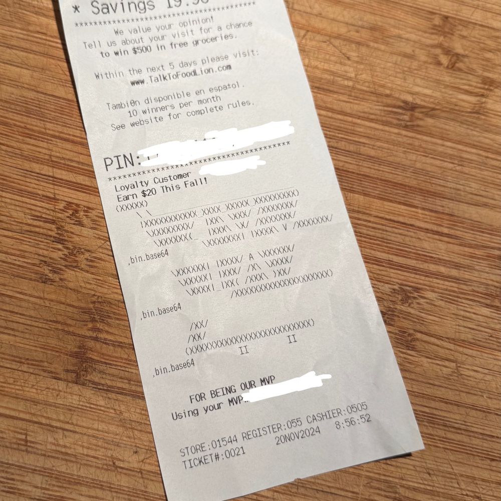 A grocery store receipt showing an undecipherable series of characters followed by ",bin.base64"