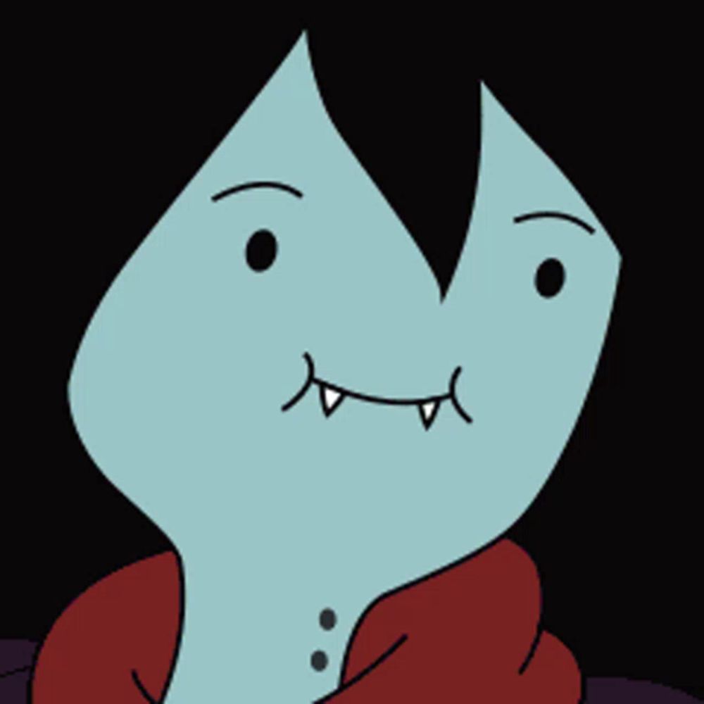 a cartoon character with fangs and a red scarf