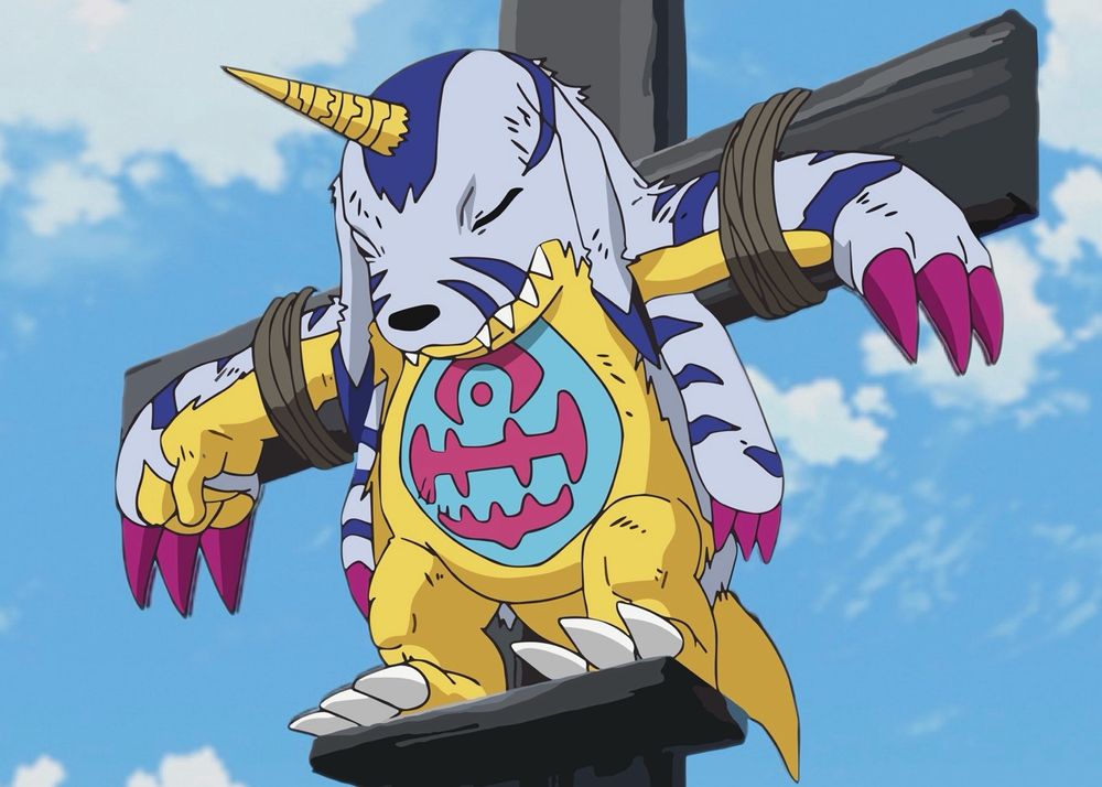 a screenshot from episode 38 of the Digimon Adventure anime reboot that came out in 2020. 

it shows the character Gabumon being crucified. this is after he is kidnapped by Mephistomon, a fallen angel digimon, & then ritualistically sacrificed to try and resurrect an ancient evil god digimon named Milleniumon.

this was in the cartoon. they showed this to children.