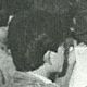Close up of the back of the head of a Japanese man in black and white in the original photo from Taito