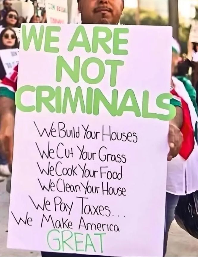 A poster held by a non-white young man during the No Kings protest on June 14th states emphatically: "WE ARE NOT CRIMINALS ... We Build Your Houses, We Cut Your Grass, We Cook Your Food, We Clean Your House, We Pay Taxes... We Make America GREAT"