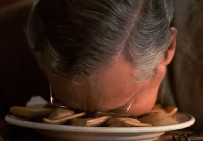 Men In Black restaurant scene with pierogi faceplant