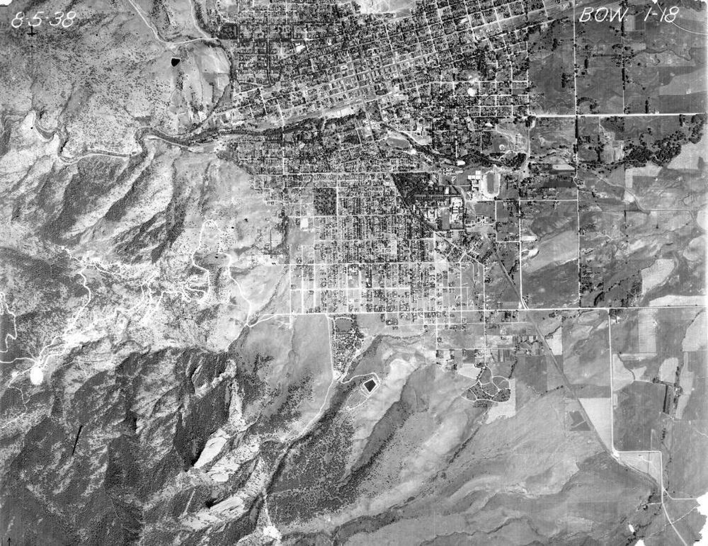 A top-down, black-and-white photograph of Boulder, Colorado.