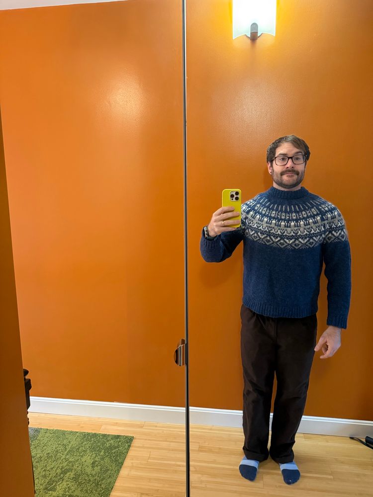 Me in a sweater and brown pants