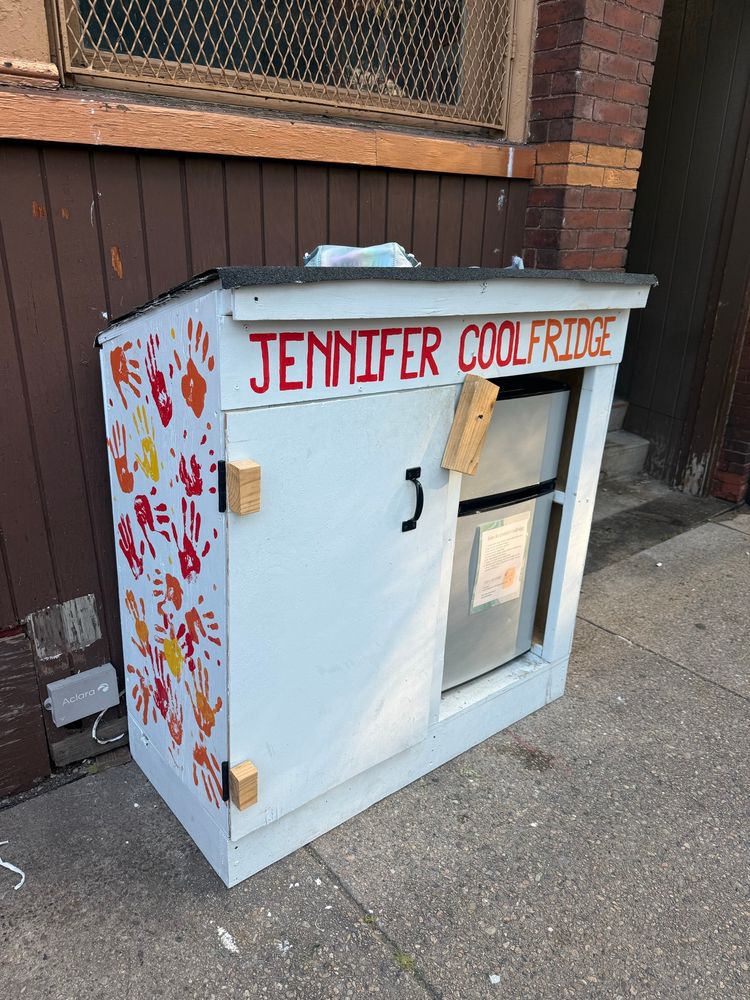 Image of a free pantry with a fridge. The box says Jennifer coolfridge.