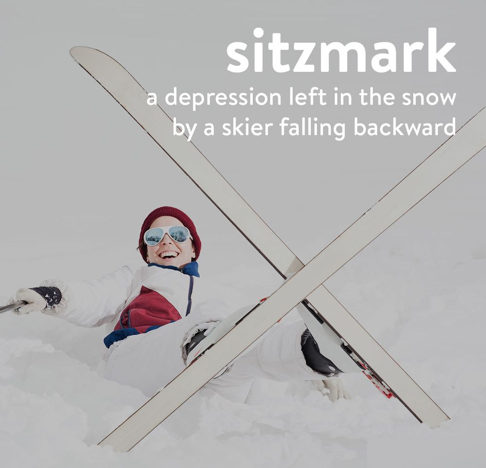 sitzmark
a depression left in the snow by skier falling backward
background image: a smiling skier who just fell