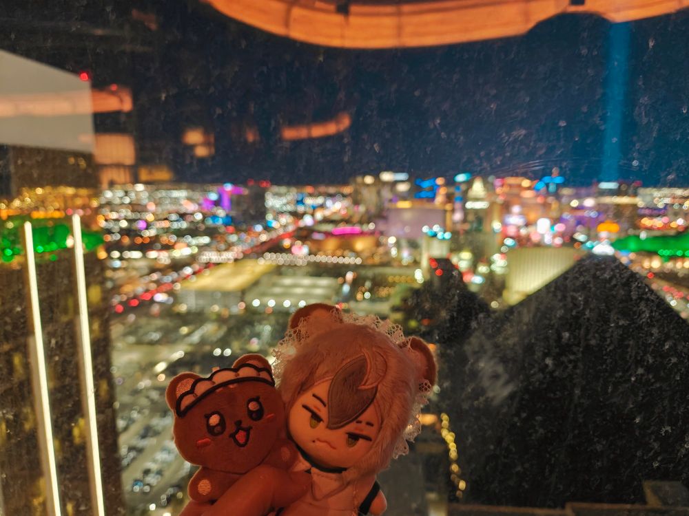 sky night view of las vegas. the luxor pyramid is visible on the right
