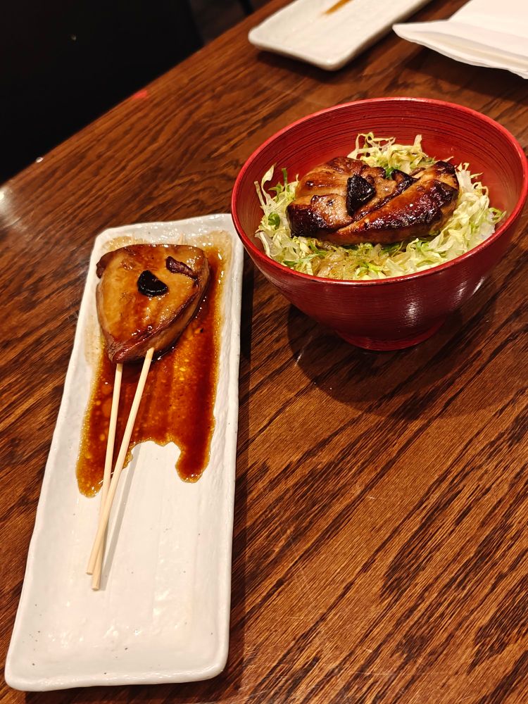 skewer of foie gras, and a rice bowl of foie gras