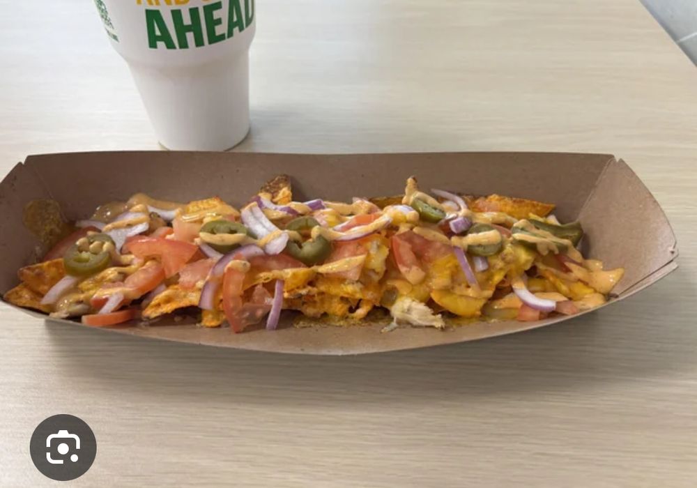 a sad sludge of cheese and carbohydrate mush with vegetables that appear long past fresh, all stuck to the bottom of a box