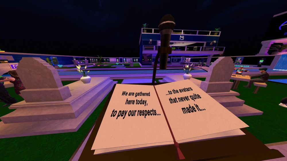 a mock funeral podium that says, "we are gathered here today to pay our respects to the avatars that didn't make it"