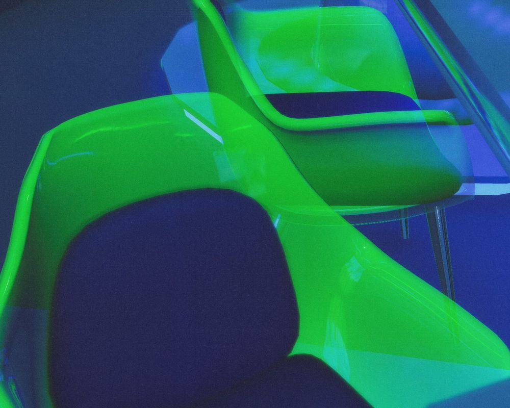 a frutiger aero-themed virtual world with all the things: frutiger aero chairs, desks, decor, etc.