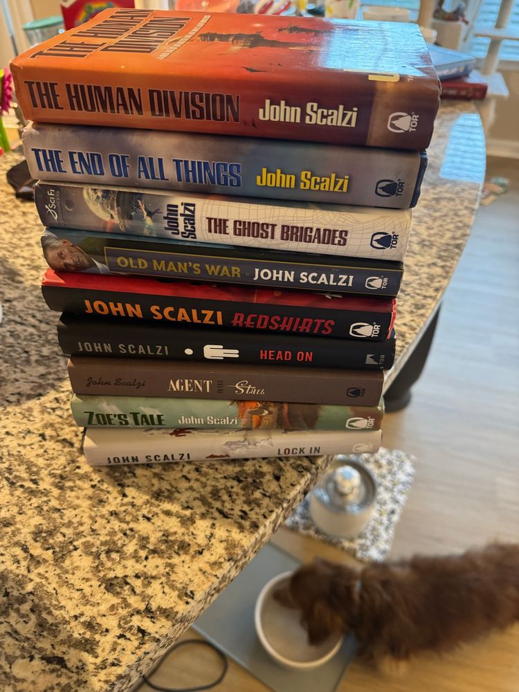 A giant pile of John Scalzi books