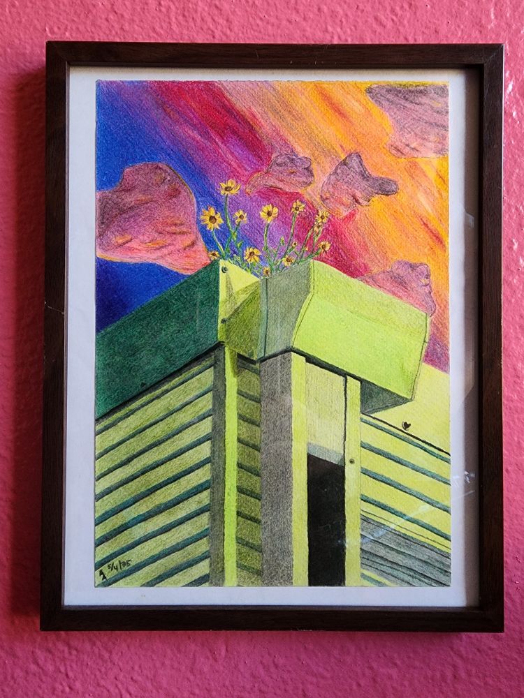 Colored pencil drawing. Upward view at the roof of a garage, where wild sunflowers grow in the gutter. Building is green juxtaposed against a sunset sky, flowers facing the setting sun. Sky is an array of oranges and pinks fading into a dark blue, cotton-candy pink clouds scattering the sun’s last beams.