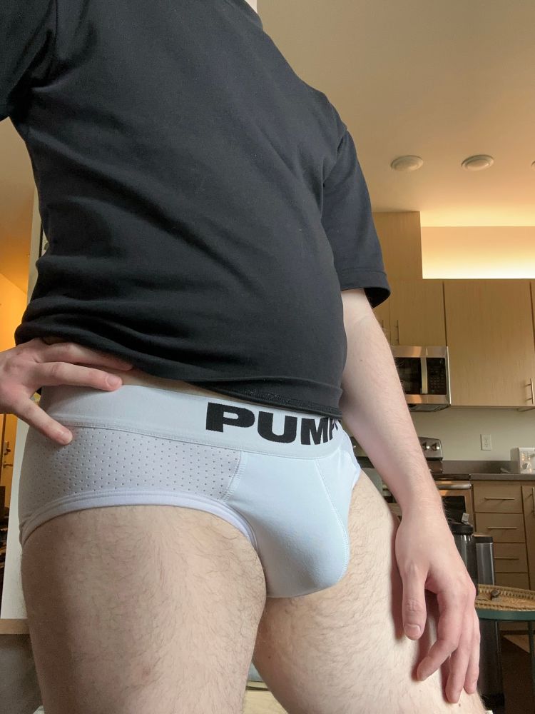 Selfie of me in a black t shirt and white PUMP briefs 