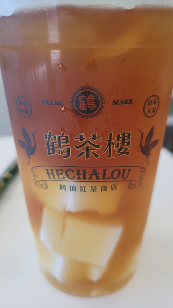 A tea from Hechalou, osmanthus oolong with almond jellies.