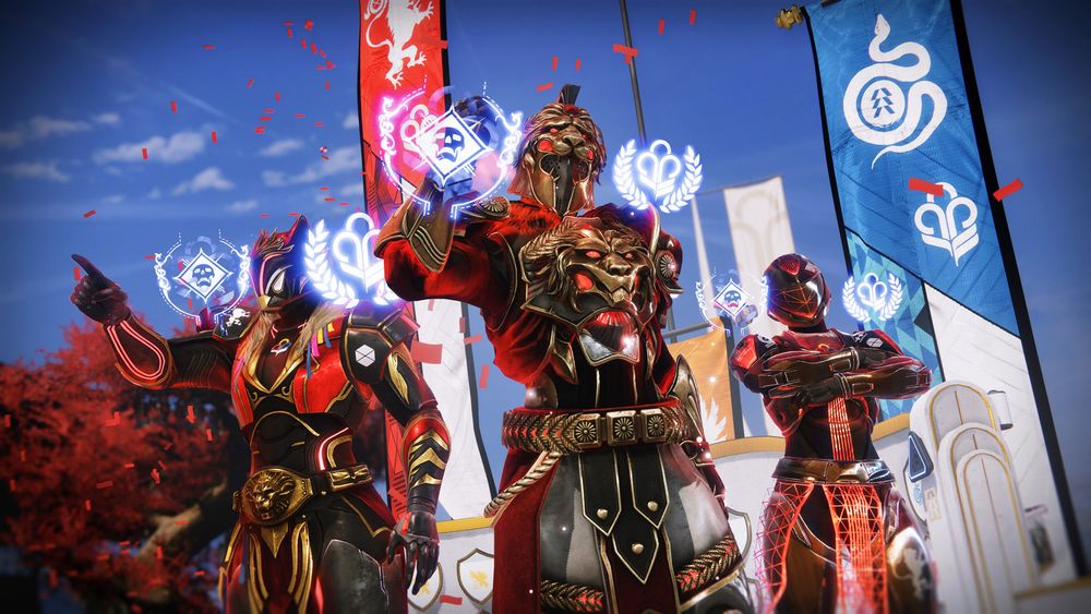A group of Titans wearing red Guardian Games armor stand triumphantly in The Tower, celebrating their win. 