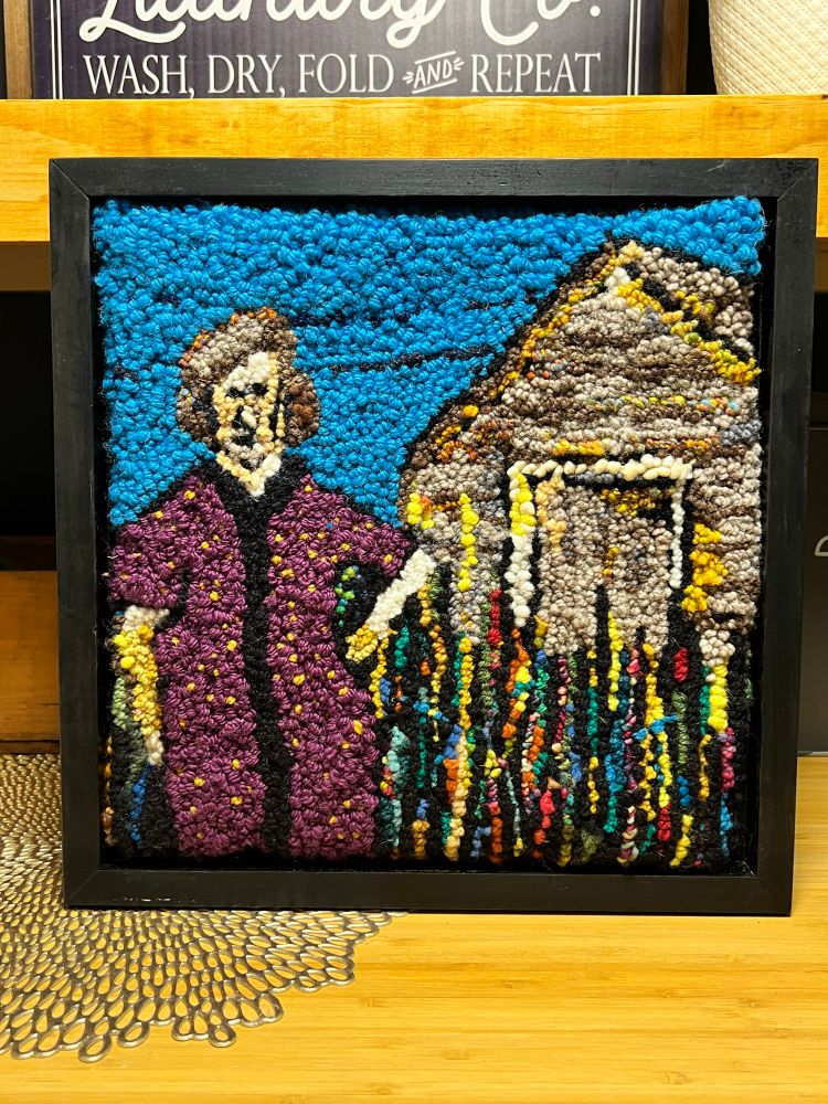 Della was the ghost in our guesthouse. Here she is posing in front of her shed