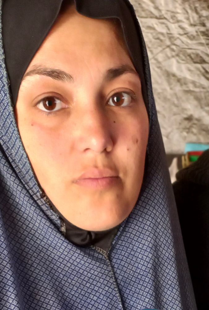 A photo of my dear friend Abeer.
The photo is taken while displacement and famine in genocide.