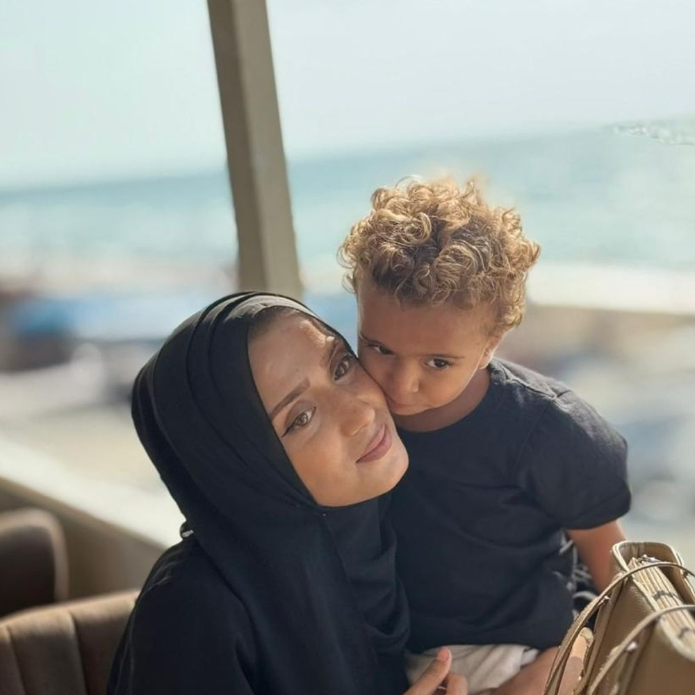 A photo of Noreen Farwana with one of her son‘s.
The photo is taken while displacement and famine in genocide. Gaza, Palestine.
