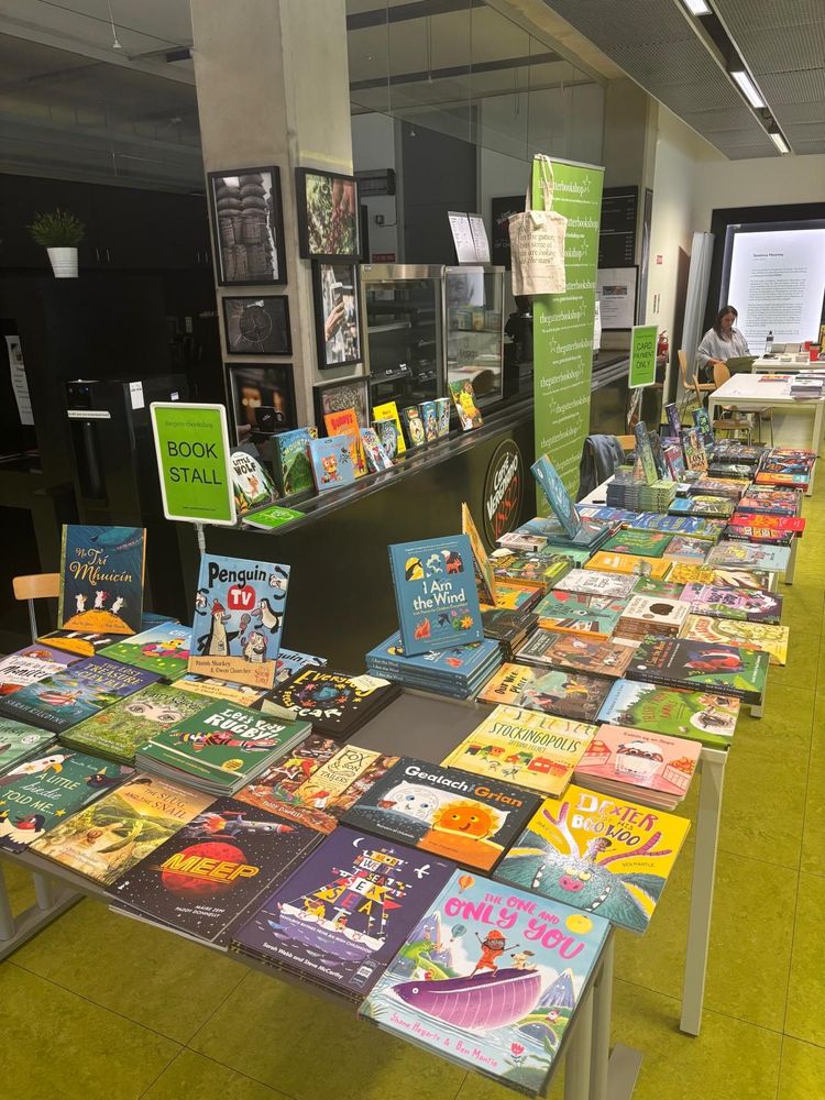 Piles of books on tables
