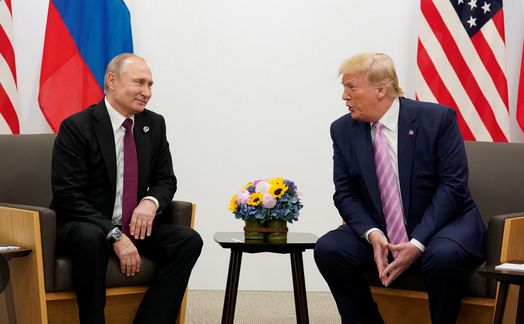 An image of trump sucking up to putin in a previous meeting...