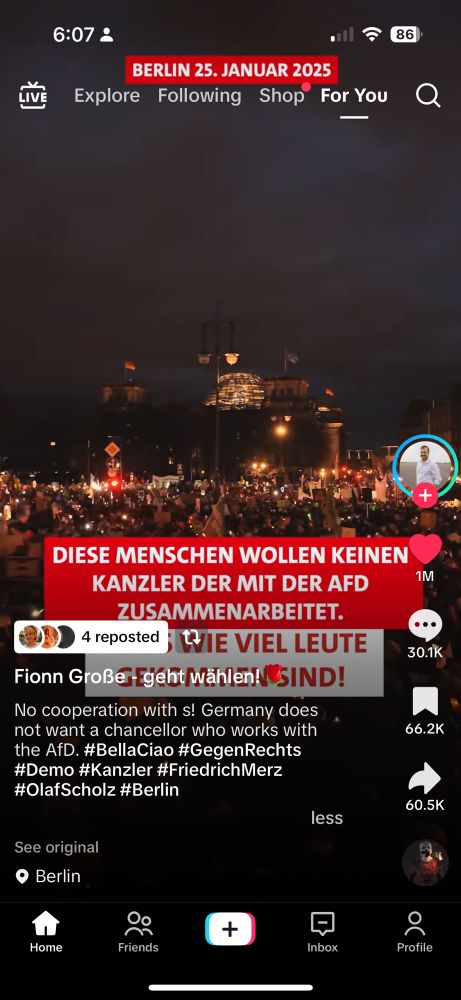 Screenshot of TikTok of protest in Germany with “Bella Ciao” playing in background. Translated text from German reads: “No cooperation with s! Germany does not want a chancellor who works with the AfD.”