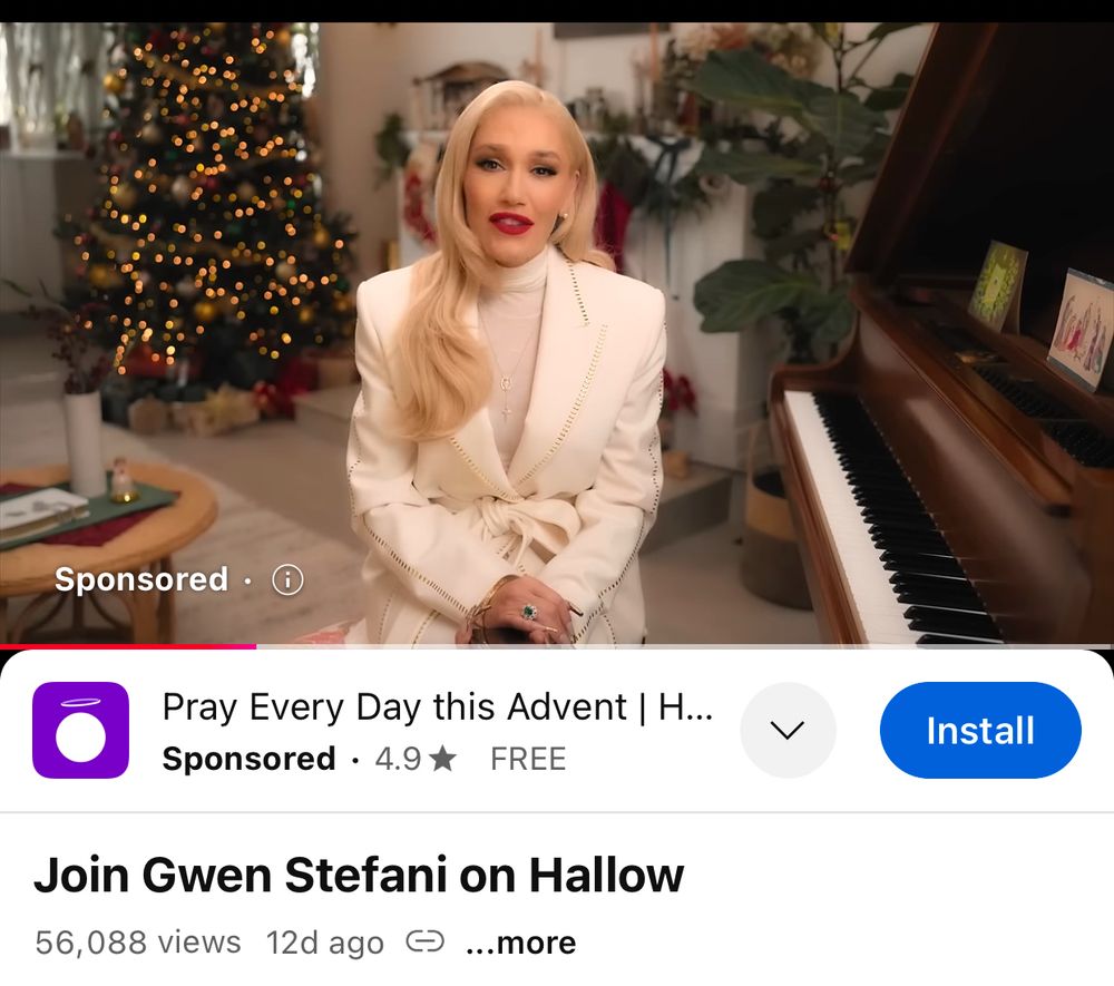 Screenshot of video of a blond woman sitting beside a piano