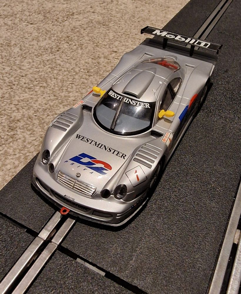 An image of a 1:32 scale Scalextric model of a Mercedes CLK LM. 
