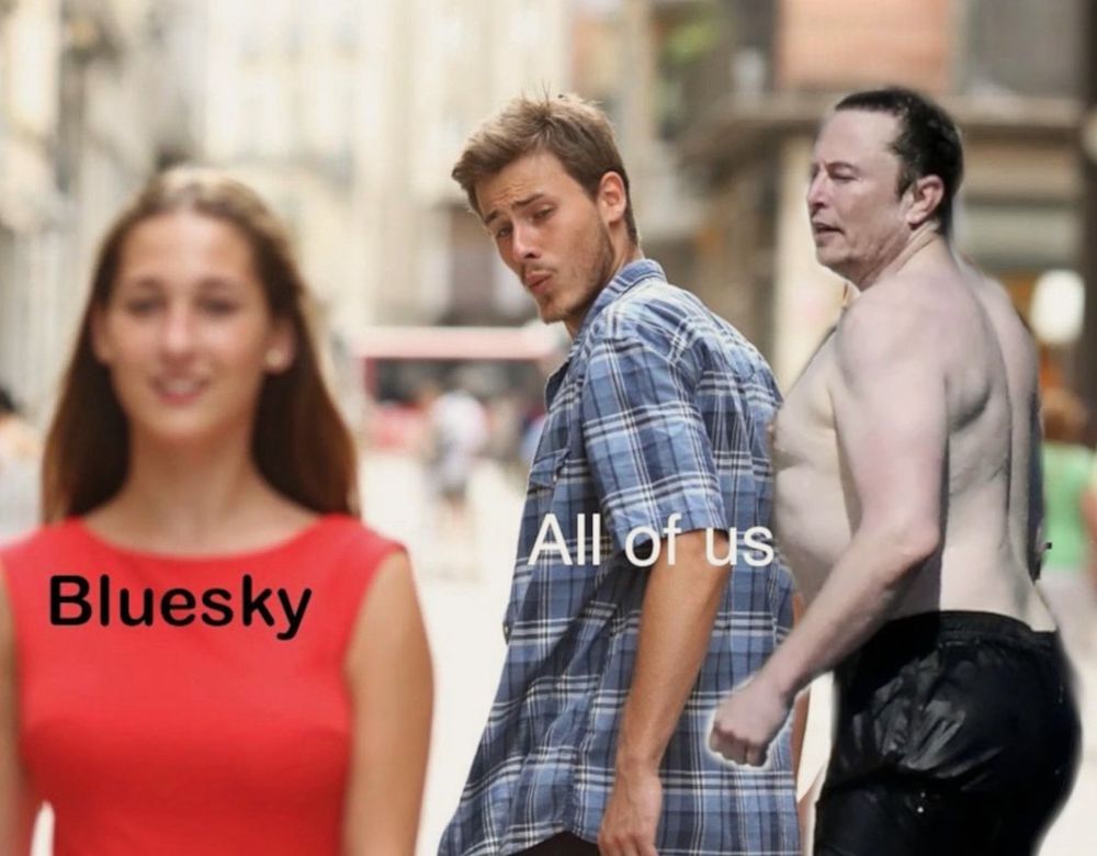 Meme of jealous girlfriend looking aghast at boyfriend looking at another girl walking by except the jealous girlfriend is a shirtless pastry tubby photo of Elon Musk and the girl walking past is labeled Bluesky. The boyfriend is labeled "All of us".