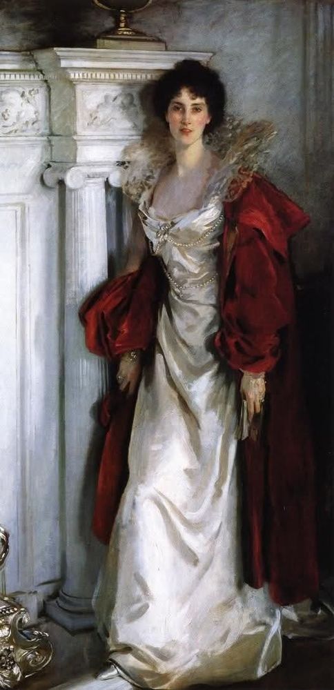 Painting by John Singer Sargent: a dark-haired fair-skinned woman in a long white satin gown with upstanding gold lace framing her neck & head, a long strand of pearls circling her body twice, pinned under her bodice and passing around her waist. Over it she wears a long red satin coat, full-sleeved, open. She leans negligently against a high white marble mantlepiece with an elaborately carved capital