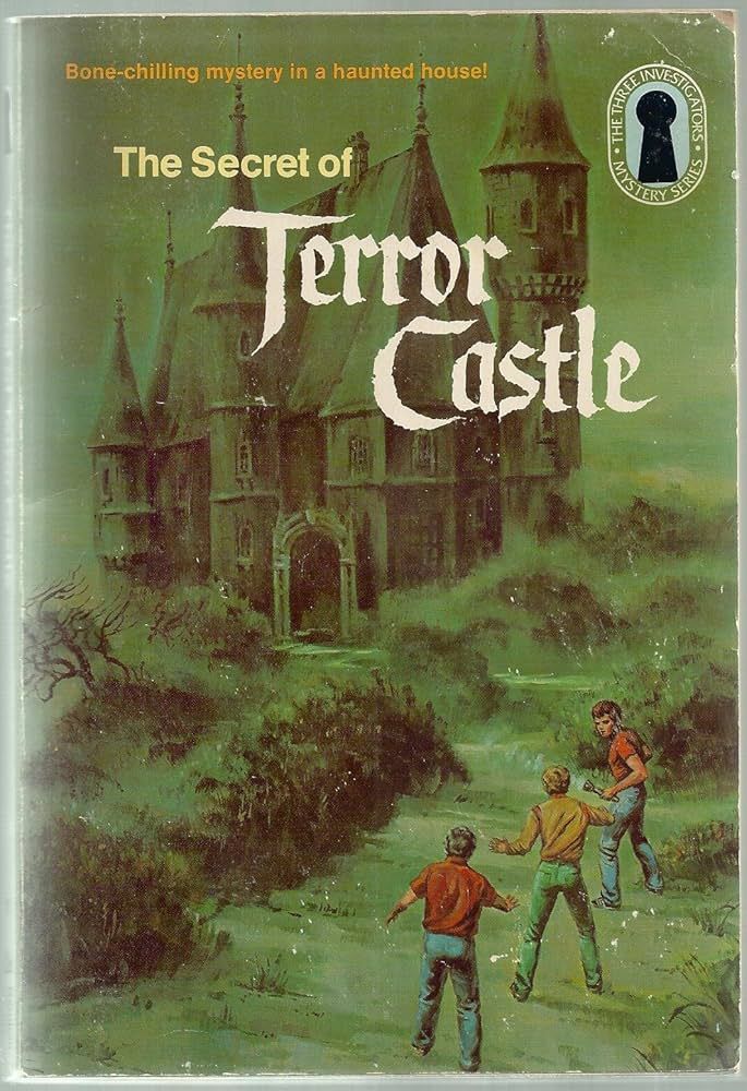 The cover of a book. Everything is green except for the three boys walking toward a castle at the end of the path. The cover says 