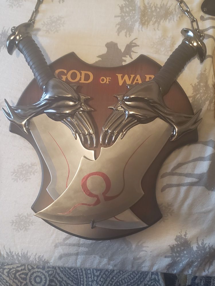 Replica blades of chaos very sharp very cool. Very heavy