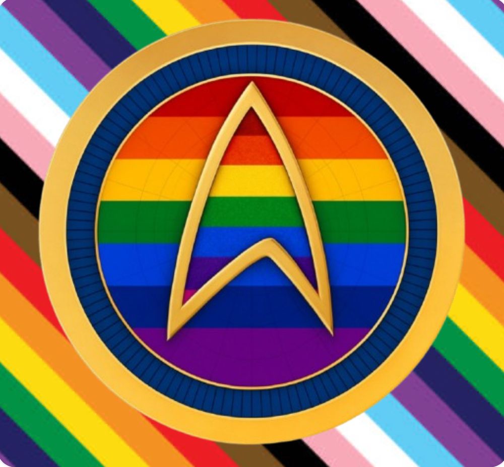Fleet admiral Sherwood’s insignia with a chevron to the centre surrounded by the pride flag