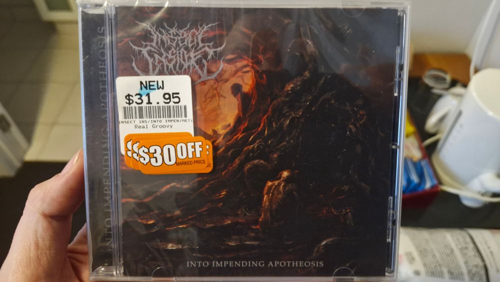 CD by a band called Insect Inside. Has a price tag of $31.95, with a discount sticker of "$30 off"