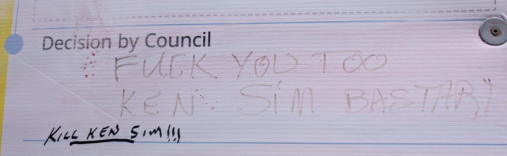 Vancouver resigning sign with graffiti: Fuck you too Ken Sim bastard, kill Ken Sim!!!
