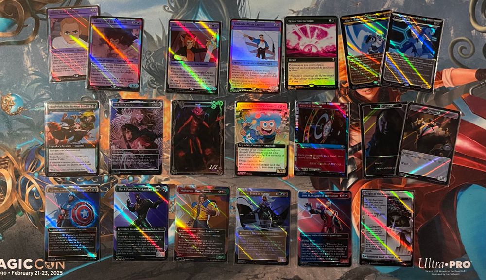 Proxies spread out on a playmat:
Trynn and Silvar as Adora and Catra
Mirri, Weathelight Duelist as Catra
Captain Lannery Storm as Seahawk
Heroic Intervention with Legend of Korra art
Akiri and Ardenn as Alura and Coran
Toski as Hoodwink
Angelic Chorus with art by Marina Montrasi
Devil toke from The Storyteller
Kasla as Ann from Amphibia
Wheel of Fortune with art from Cowboy Bebop
Disguise tokens with Blitzcrank and The Master
Marvel Rivals versions of the Marvel Secret Lair characters 
Urza’s Saga with Legend of Korra art