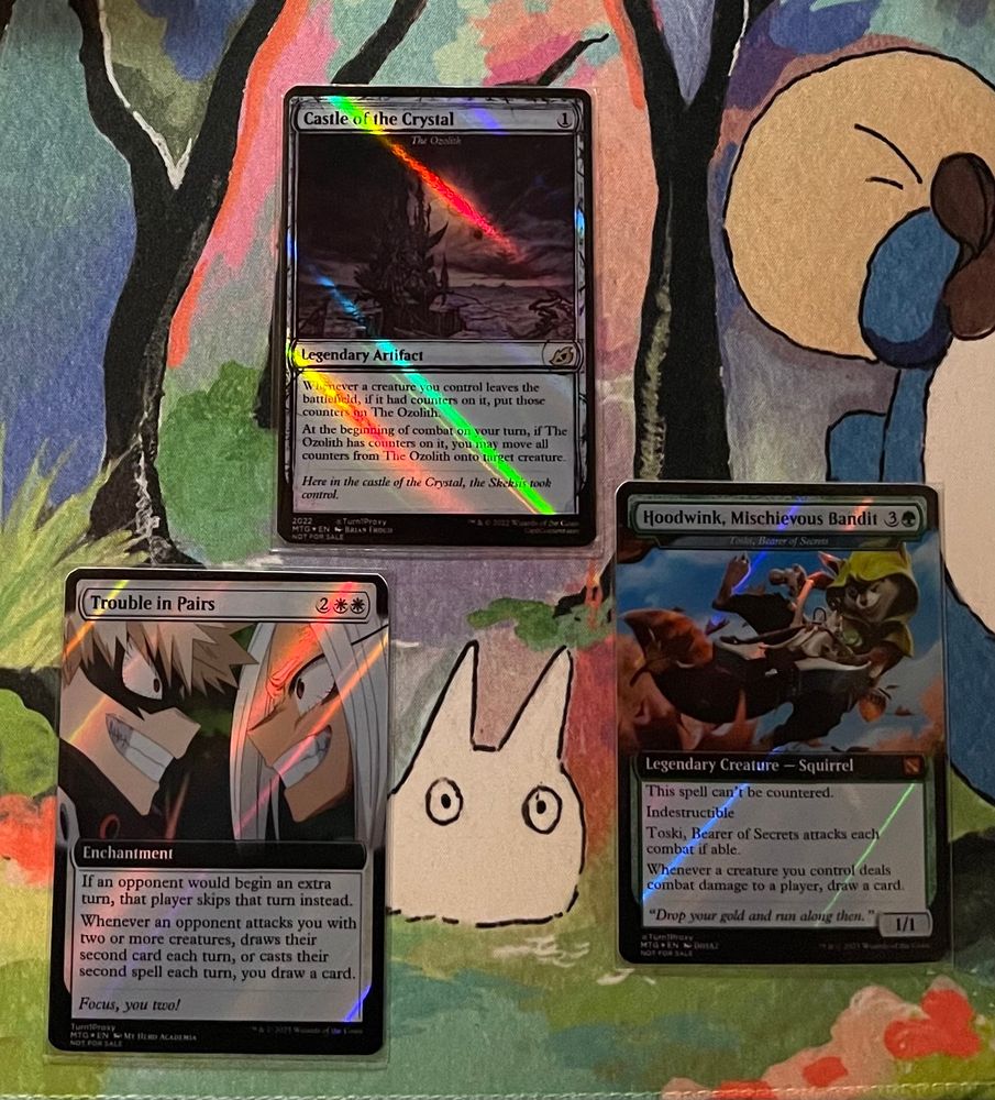 3 proxy MtG cards:
Trouble in pairs with My Hero Academia, Bakugo and Mirko
The Ozolith as Castle of the Crystal using concept art from The Dark Crystal
Toski, Bearer of Secrets as Hoodwink, Mischievous Bandit with art from DotA2 