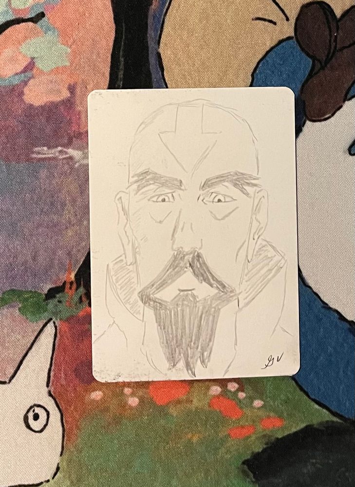 Back of the Tenzin card, plain white card with pencil sketch of Tenzin’s face. 