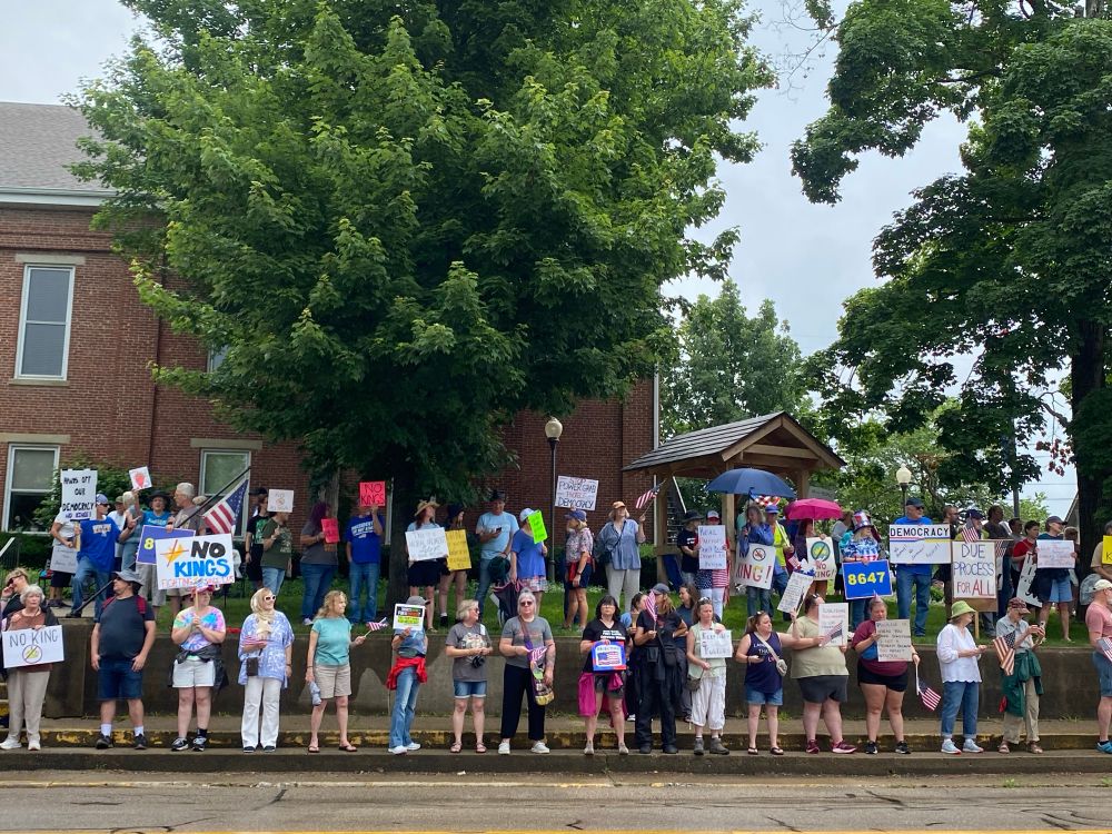 A line of #NoKings protesters at the Brown County Courthouse in Nashville, Indiana