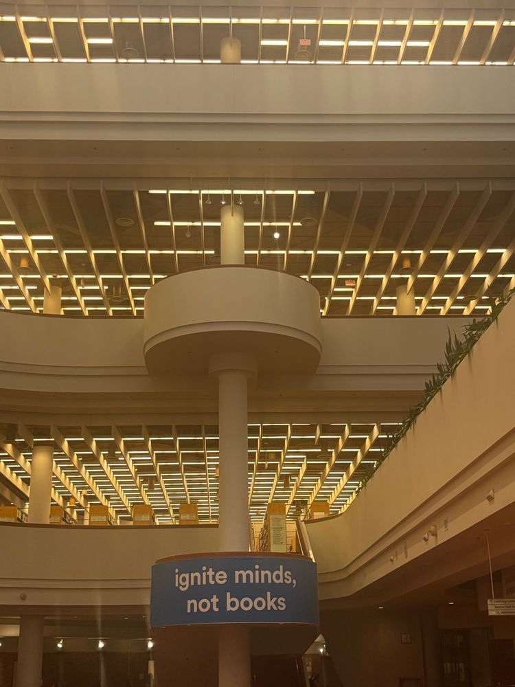 Sign at Toronto Reference Library: “Ignite minds, not books.”