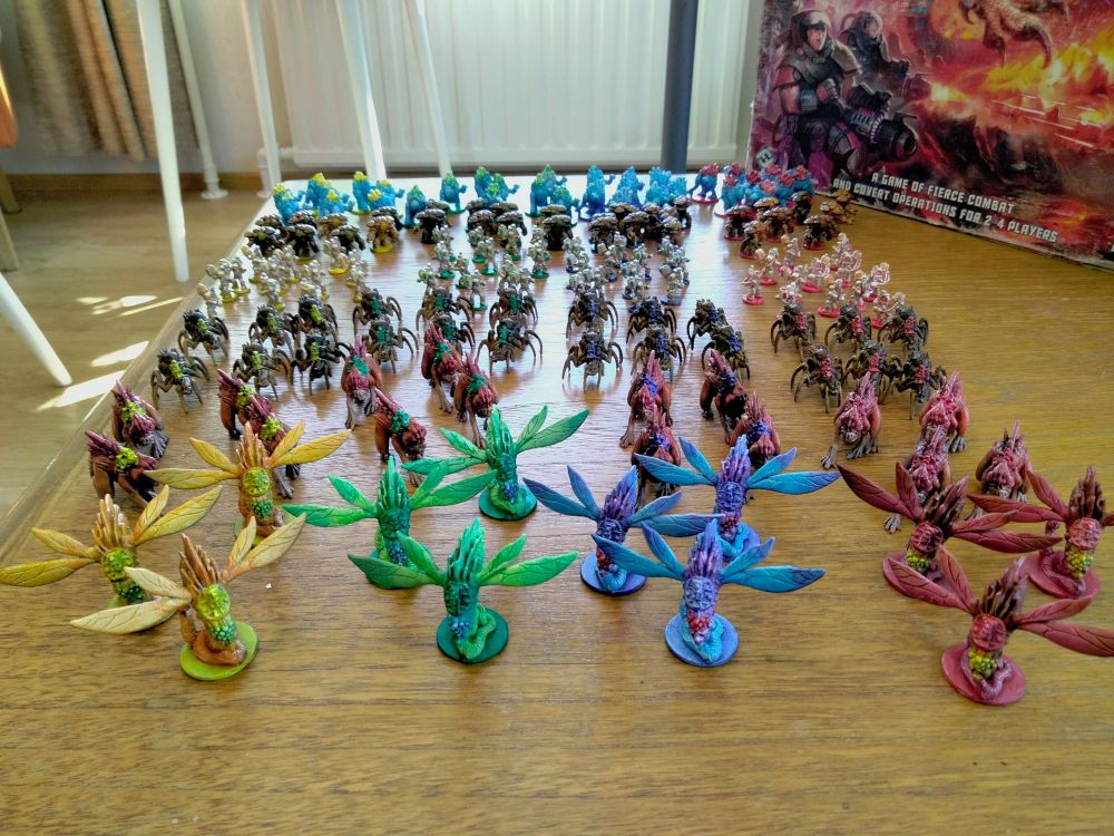 Nexus Ops miniatures painted in 4 player colours