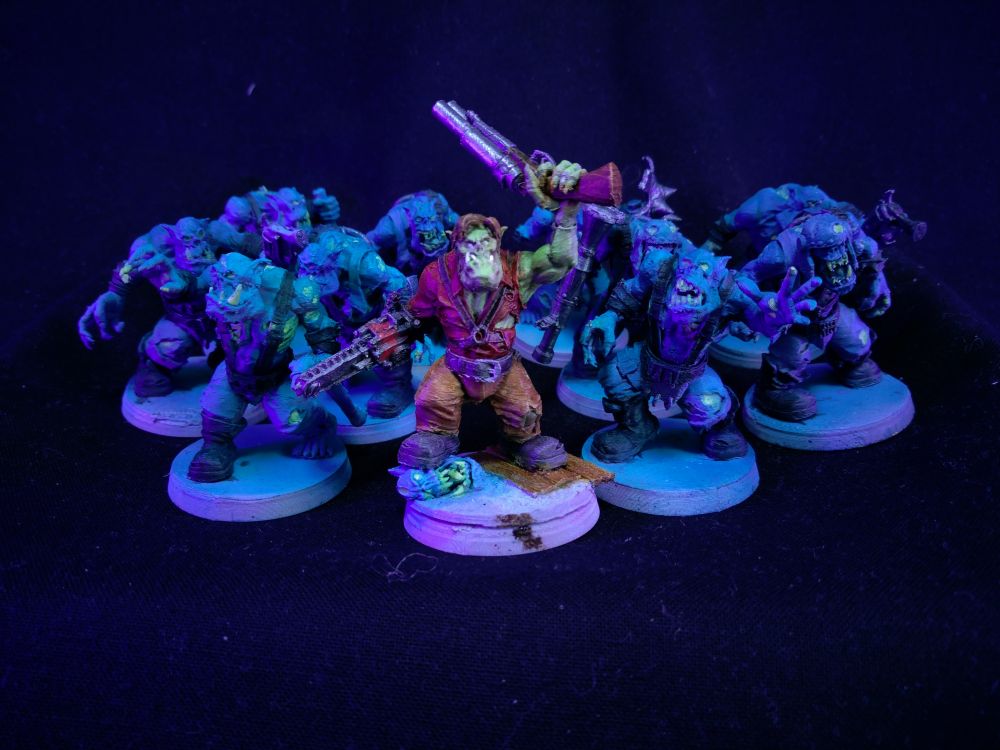 Ash Williams style ork leading 10 ork zombies.