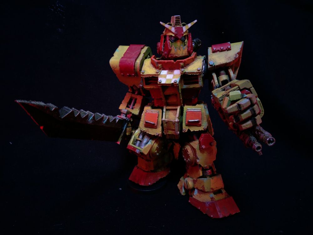 yellow and red Looted Gundam with a raised gun