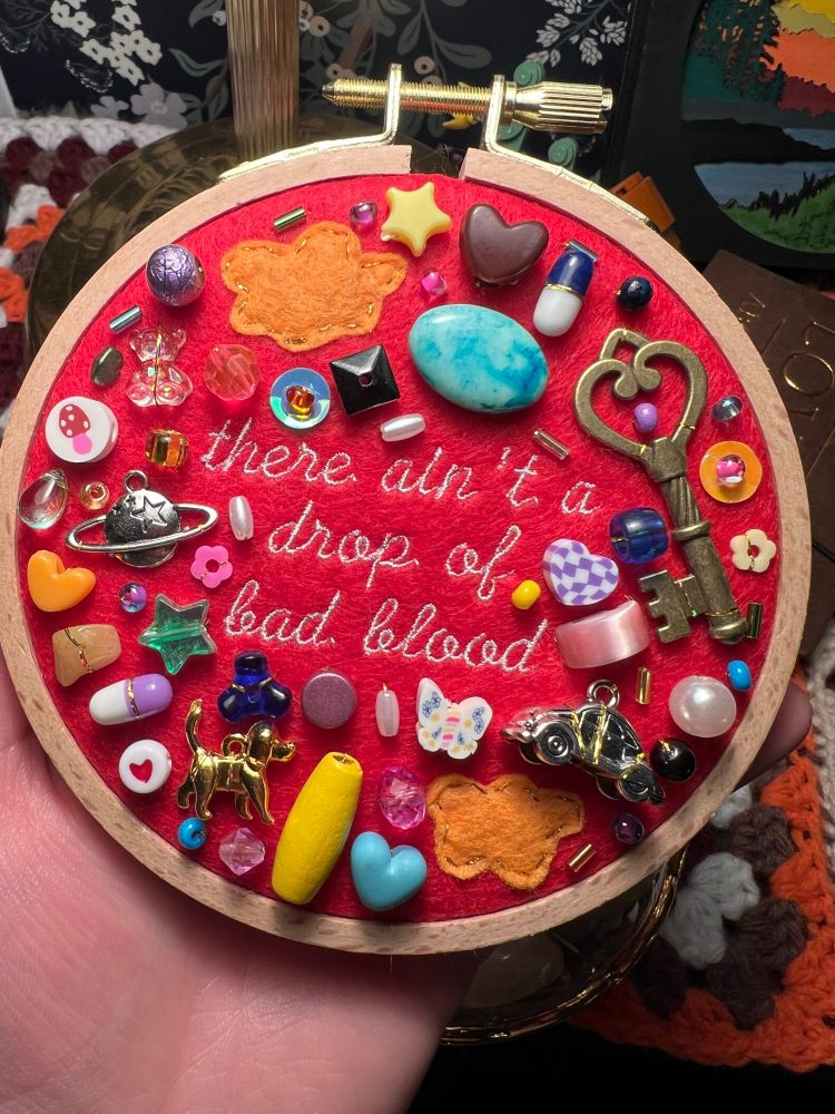 charm embroidery hoop of lyrics from noah kahan’s song “all my love”